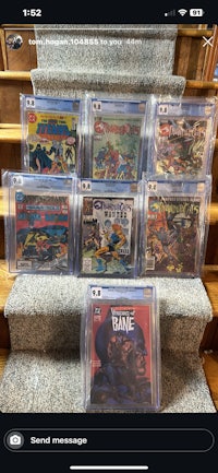 a collection of comic books on a staircase