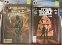 two star wars comics are on display